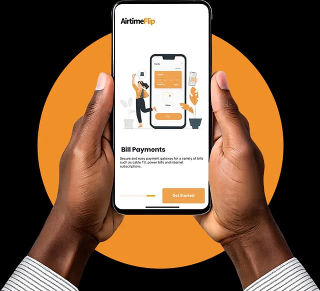 Hands holding a phone showing AirtimeFlip bill payment service