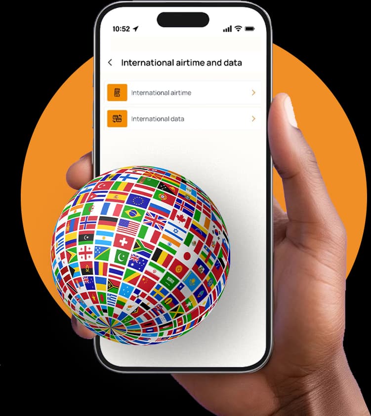 A hand holding a phone showing AirtimeFlip international airtime and data top-up service and a globe of all countries' flags